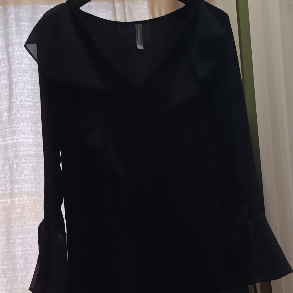 Very nice looking top made by Massini